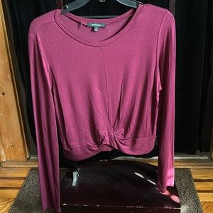 Burgundy ambience, semi midriff top.